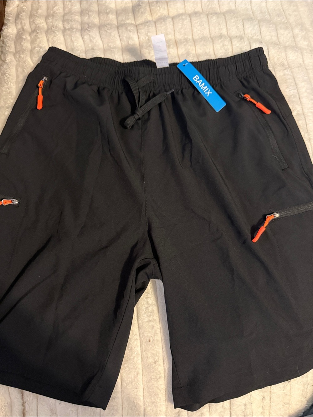 Black Shorts with Orange Zip Pulls